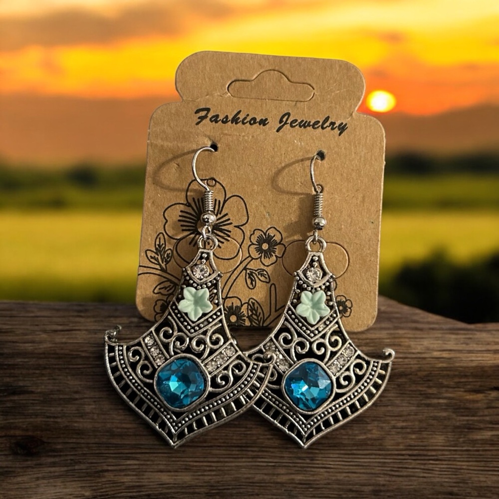 Silver toned dangle western style earrings
